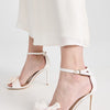 Stuart Weitzman Women's Nudistcurve Love Knot 100mm Sandals, Ivory, White, 11 Medium US