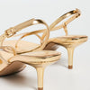SCHUTZ Women's Heloise Sandals, Ouro Claro Orch, Gold, Metallic, 9 Medium US