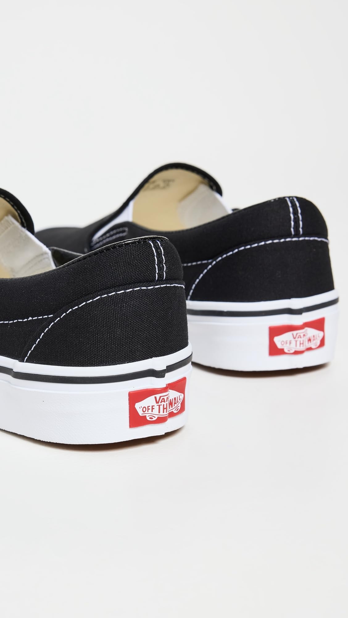 Vans Slip On Unisex Sneakers, Black/White, 12 US Women/10.5 US Men