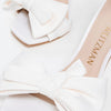 Stuart Weitzman Women's Nudistcurve Love Knot 100mm Sandals, Ivory, White, 11 Medium US