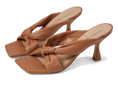 Stuart Weitzman Playa 75 Knot Sandal for Women - Sculptural Heel, Voluminous Knotted Detail, and Lacquered Nappa Leather Footwear Tan 7.5 M