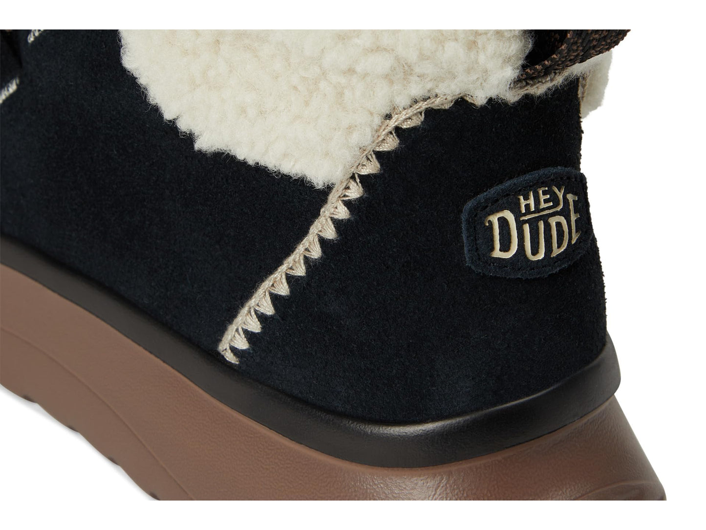HEYDUDE Women's Wendy Peak Apres Suede Cozstit Black/Tan 9 Medium