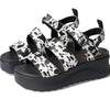 HEYDUDE Women's Delray Buckle Animal Black/White 11 Medium