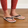OLUKAI Pi'oe Women's Beach Sandals, Water-Resistant Flip-Flop Slides, Ulta Soft & Comfortable Fit, Wet Grip Soles, Trench Blue/Mist Grey, 6