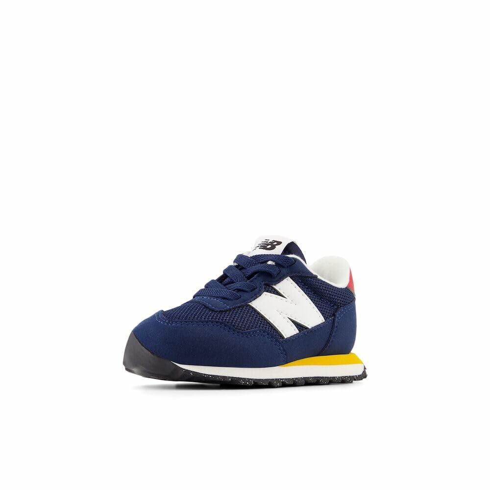 New Balance Kids 237 Bungee Sneaker, NB NAVY/VARSITY GOLD, 7.5 M Toddler (1-4 Years)