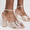 Loeffler Randall Women's Camellia Pleated Knot Heeled Sandals with Ankle Strap, Champagne, Gold, Metallic, 8.5 Medium US