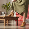 Shoes for Wholesale tan leather cage heeled sandals with open toe and zippered heel closure.